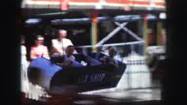 Kansas City Missouri (1959): Kids Going Round And Round On A Carnival Ride In