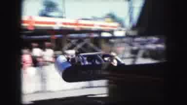 Kansas City Missouri (1959): Children Riding Flying Circular Amusement Park Ride