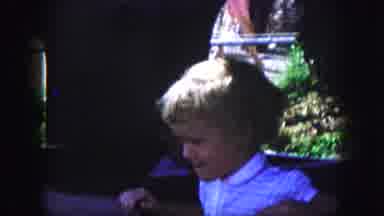 Kansas City Missouri (1959): Small Children Blowing Out Birthday Candles At A Home