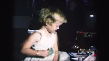 Kansas City Missouri (1959): Young Child Is Dancing In A Dress With Money In Her