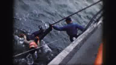 Kansas City Missouri (1959): Man Rescued From Water Using A Gaff Pole To Pull Him