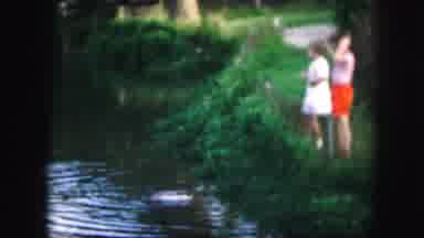 Kansas City Missouri (1959): Two Children Skipping Stones In The Pond On A