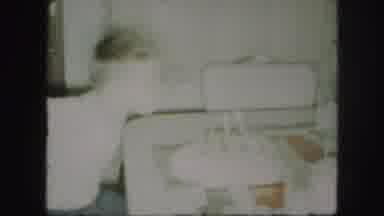 Kansas City Missouri (1959): Little Boy Blows Out His Birthday Candles With Three