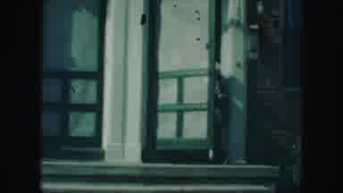 Kansas City Missouri (1959): People Leaving A House In A Cozy Little Town On A