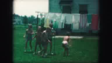 Kansas City Missouri (1959): Several Small Children Play Together Outside On A