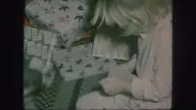 Kansas City Missouri (1959): Girl In Pajamas Trying To Get Dog's Help Opening