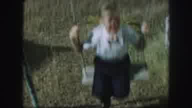 Kansas City Missouri (1959): Young Boy Plays On Swing On A Lovely Summer Day