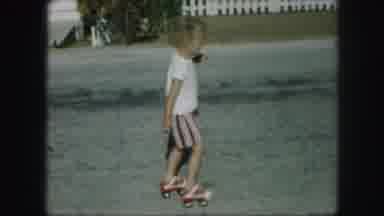 Kansas City Missouri (1959): Young Child Learning How To Roller Skate On The