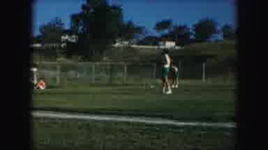 Kansas City Missouri (1959): Softball Pitcher Serves Up A Pitch To Awaiting Batter