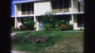 Kansas City Missouri (1959): A House With Flowers And Shrubs In The Front With A