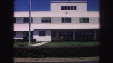 Kansas City Missouri (1959): White Building With A Manicured Lawn In The Front And