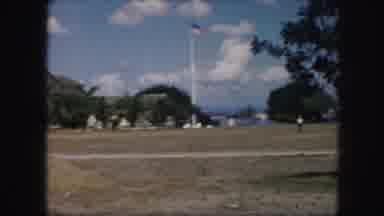 Kansas City Missouri (1959): Person Walking Across Mostly Open Field And A Car