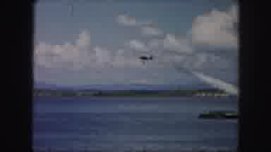 Kansas City Missouri (1959): Dark Plane Flying Very Low Near Boats Anchored Close