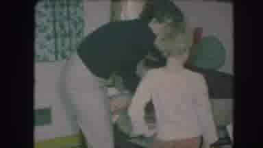 Kansas City Missouri (1959): Woman Wrapping Christmas Gifts Shares Her Scissors