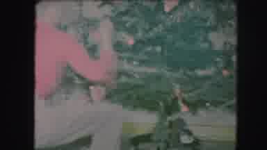 Kansas City Missouri (1959): Two Kids Are Decorating The Christmas Tree And A Dog