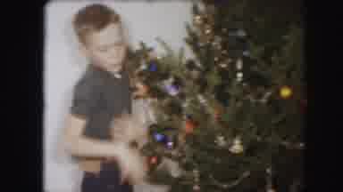 Kansas City Missouri (1959): Family Working Together To Decorate A Christmas Tree