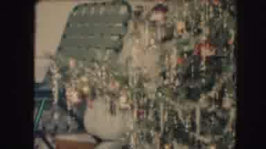 Kansas City Missouri (1959): Young Boy Hands Out Presents On Christmas Morning In
