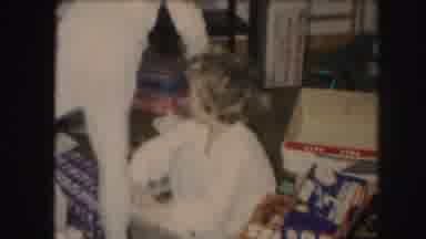 Kansas City Missouri (1959): Children In Pajamas Unwrapping Presents Together As A