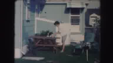 Kansas City Missouri (1959): A Clumsy Woman Starts Preparing For A Barbecue In Her