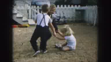 Kansas City Missouri (1959): Children Playing In A Backyard And Decorating A