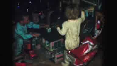 Kansas City Missouri (1959): A Girl And A Boy Opening Presents By A Tree And