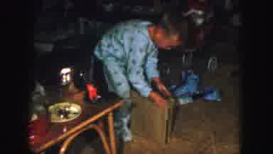 Kansas City Missouri (1959): Boy In Pajamas Rips Open Christmas Present In Family