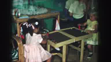 Kansas City Missouri (1959): Children Play In A Living Room Girls Use Toy Hammers