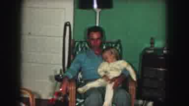 Kansas City Missouri-1959: Man Sitting In A Chair With A Little Girl On His Lap