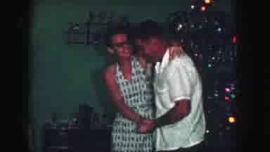 Kansas City Missouri (1959): Husband And Wife Having Fun And Dancing On Christmas
