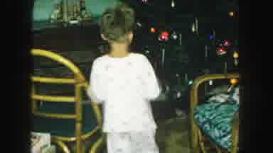Kansas City Missouri (1959): Boy And Girl In White Pyjamas Putting Christmas