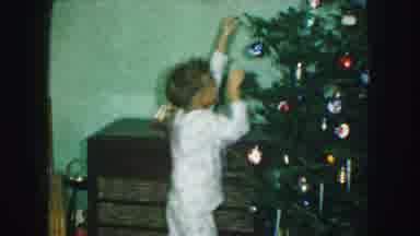 Kansas City Missouri (1959): A Boy Girl And Their Mom Hanging Ornaments On A
