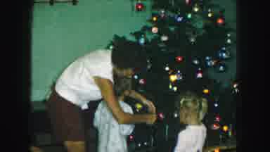 Kansas City Missouri (1959): Footage Of Mother And Two Children Hanging Baubles On