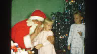 Kansas City Missouri (1959): Santa Gives Hugs To Young Children On Christmas