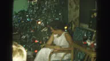 Kansas City Missouri (1959): Two Older Women Sit And Watch Young Girl Ironing Some
