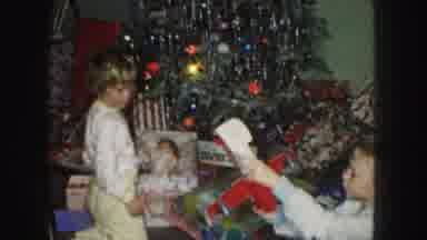 Kansas City Missouri (1959): Family Opening Presents Under The Christmas Tree On