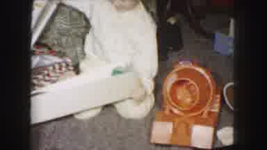 Kansas City Missouri (1959): A Little Child Opening Up Their Resent On Christmas