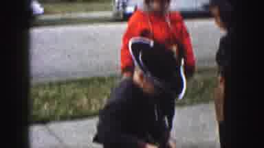 Kansas City Missouri (1959): Little Kids Dressing Up In Outfits Playing With Each