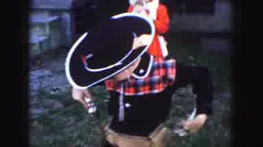 Kansas City Missouri (1959): Young Girl In Red Coat And Young Boy Dressed As A