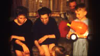 Kansas City Missouri (1959): Children Are Reacting To Presents Excitedly