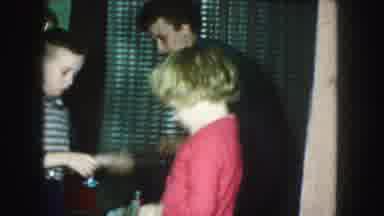 Kansas City Missouri (1959): Young Boy Gets Excited About Noise Maker And Shows It