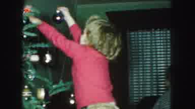 Kansas City Missouri (1959): Children Are Decorating The Pretty Christmas Tree In
