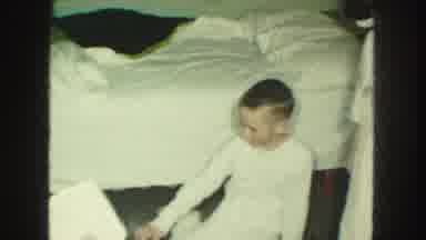 Kansas City Missouri (1959): Child Sees Something And Picks Up Box Containing