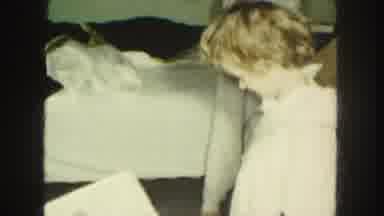Kansas City Missouri (1959): Young Children Opening Presents And Being Happy With
