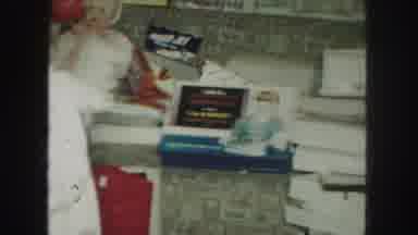 Kansas City Missouri (1959): Children's Clothing And Toys In Boxes Being Unwrapped