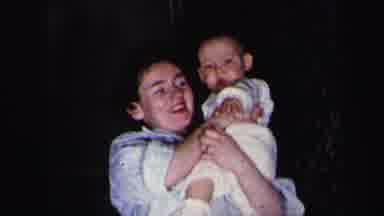 Lynbrook New York (1975): Woman Shows Off Wiggly Baby And Baby Accidently Hits The