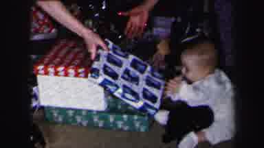 Lynbrook New York (1975): Babies Receiving Presents On Christmas