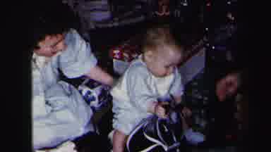 Lynbrook New York (1975): Baby With Mother Sitting On Horse Toy At Christmas