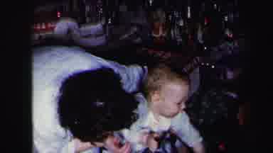 Lynbrook New York (1975): Baby Christmas Presents Smile Mom Happy Holidays Family