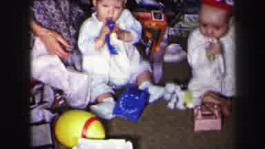Lynbrook New York (1975): Little Kids Sitting Down Playing With Christmas Trees