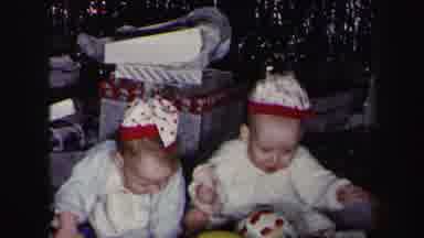 Lynbrook New York (1975): Two Baby Girls Playing Together With Their Toys During